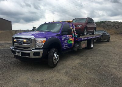 Cancer Truck Towing 2 cars pic